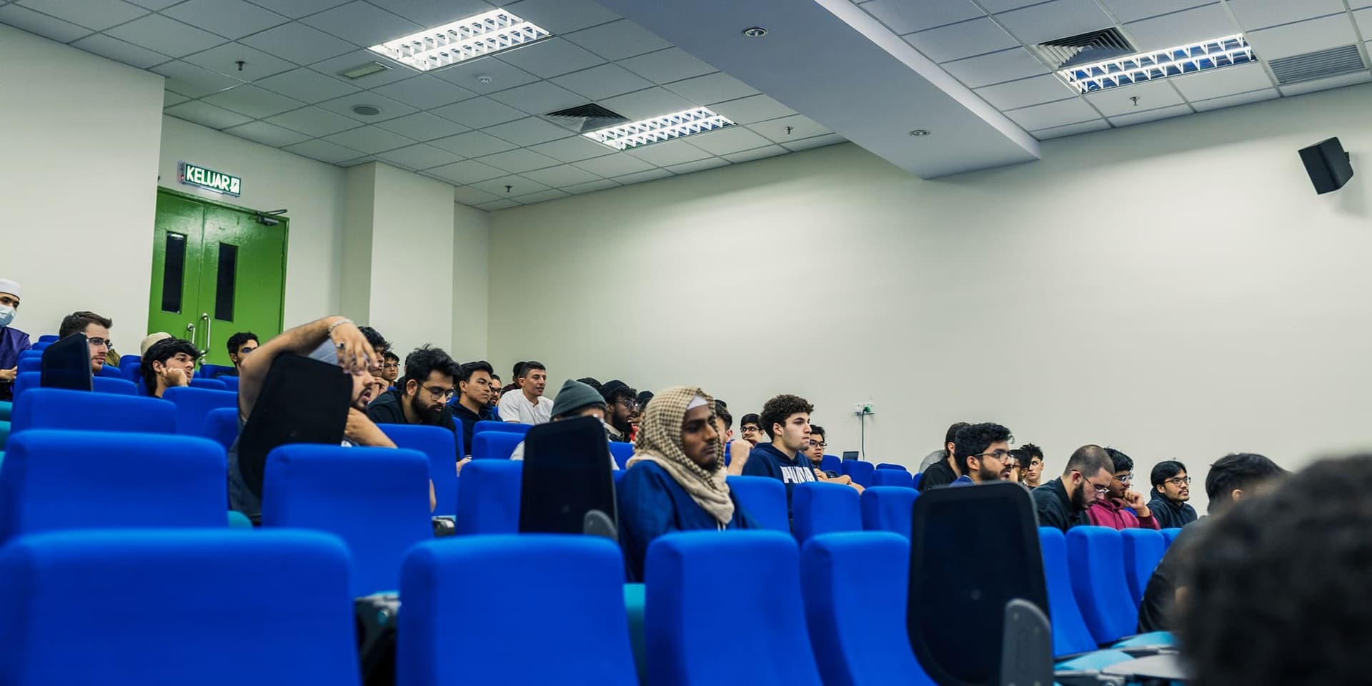 Image of audience at a live talk